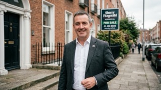 Independent Irish estate agent outside a Georgian property